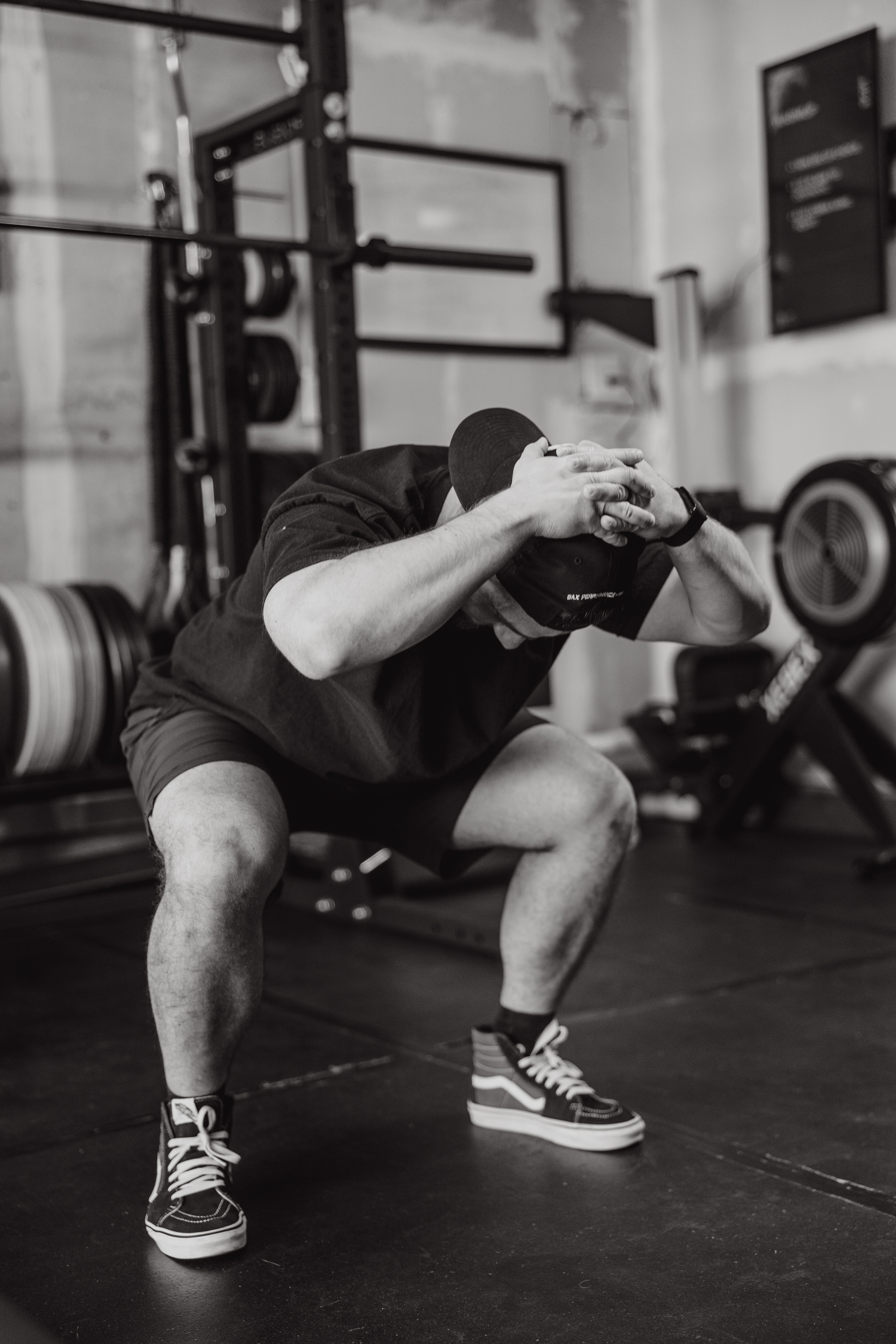 Athlete practicing hip hinge and athletic low-position mechanics at Bax Performance and Rehab in Pleasanton, CA to reduce knee pain and improve movement efficiency.